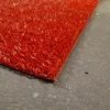 Lábtörlő tekercs, piros, műanyag tüskés, kaparó, sárleszedő, 91cm széles tekercs "AstroTurf"