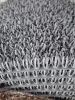 Lábtörlő tekercs, szürke, műanyag tüskés, kaparó, sárleszedő, 91cm széles tekercs "AstroTurf"